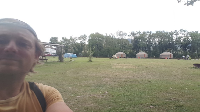 This is an image of me at the campsite with chickens and family campers.