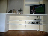 Home office desk with builtin shelving units
